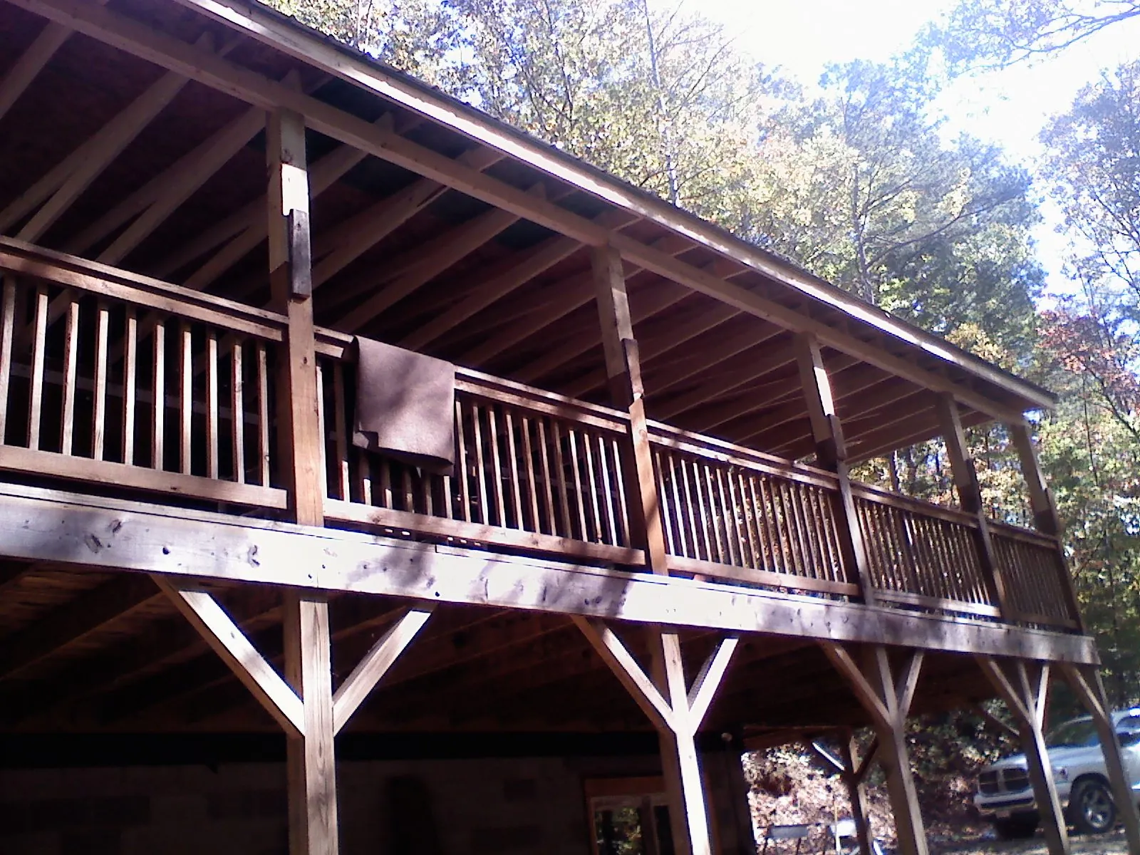 Timber framing under a new elevated porch and deck in Malta